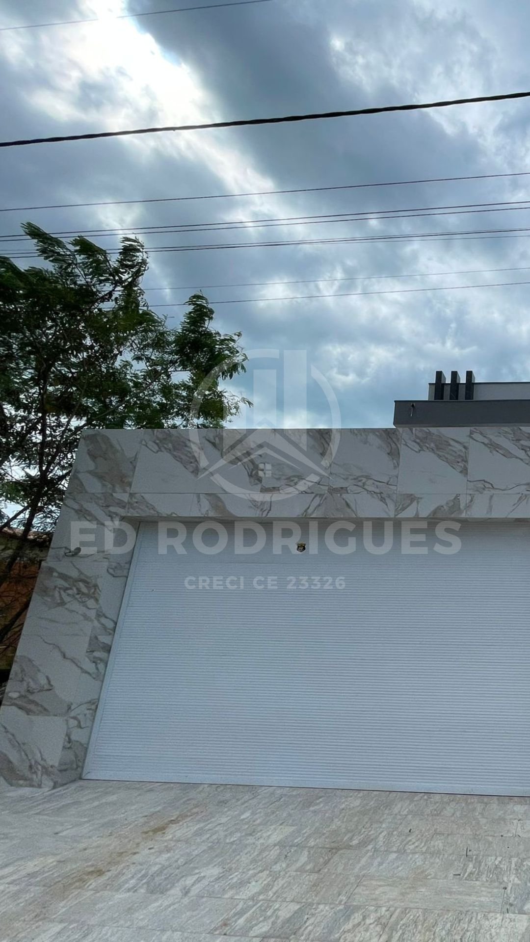 casa-venda-praia-pacheco-fachada-04