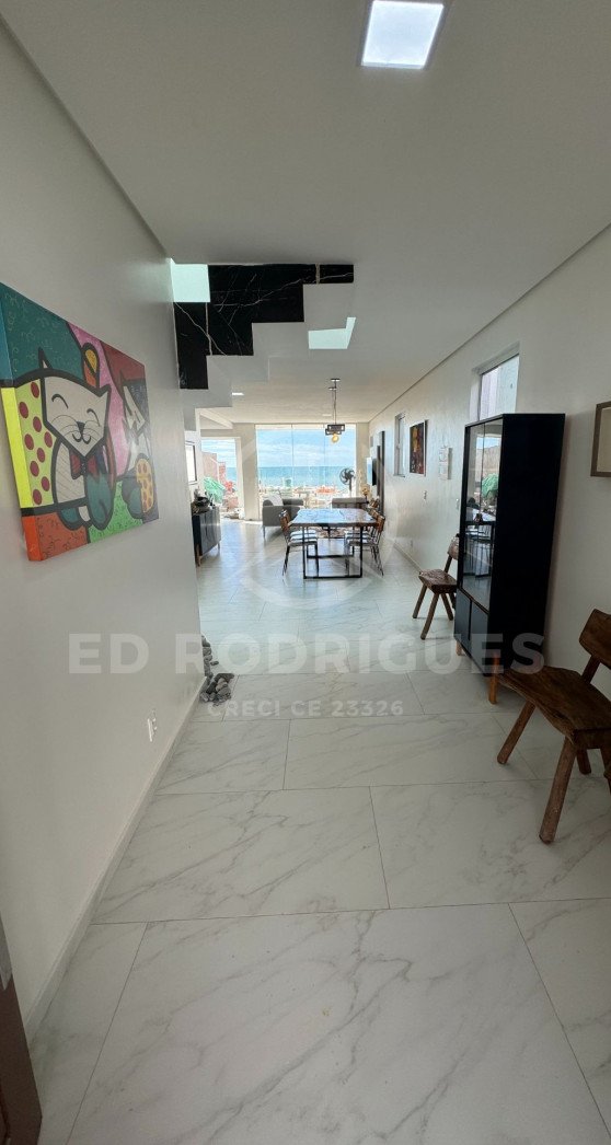 casa-venda-praia-pacheco-hall-decorado-1