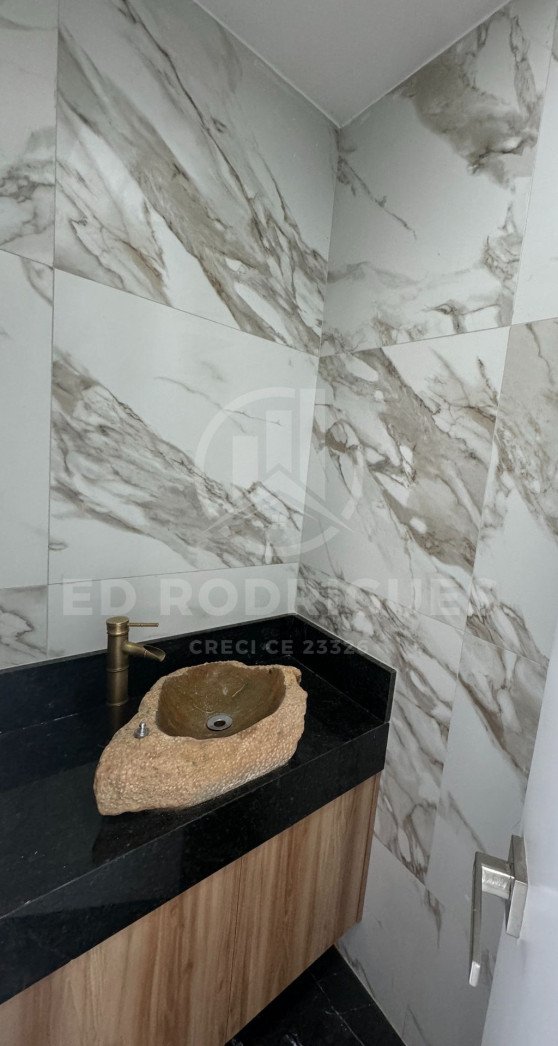 casa-venda-praia-pacheco-lavabo-03
